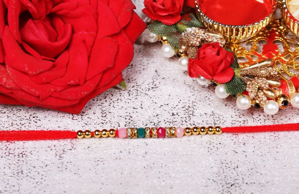 Elegant Beads and Kundan Rakhis
